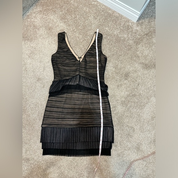 BCBG black dress in size Medium. Place offer I will defently consider Thanks. - Picture 9 of 10